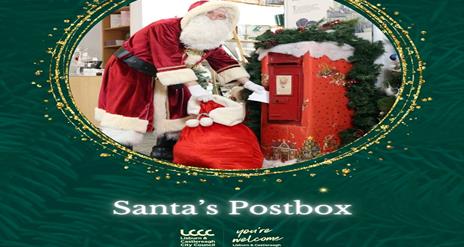 Image is of Santa Claus emptying the post box into his Christmas sack