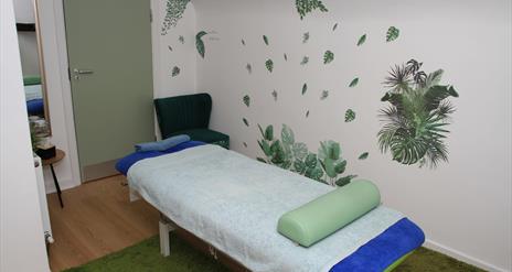 Image is of a treatment room at Therapy Zone