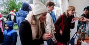 Browsing the stalls and chatting to traders at Royal Hillsborough Christmas Market