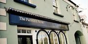 Image is of the front of the restaurant showing its name