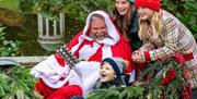 Santa and children in a sleigh in Hillsborough Castle & Gardens