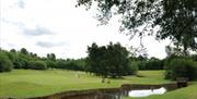 image of hole with small lake