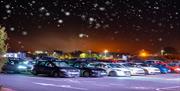 Image shows cars lined up for Movie Night at Let's Go Hydro