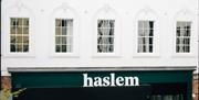 Image shows frontage of hotel facing out onto Lisburn Square
