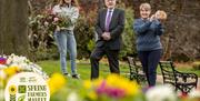 An image of Alderman Allan Ewart - Chairman of the Development Committee in Lisburn & Castlereagh City Council with two traders who will be attending