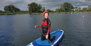 Child paddle boarding