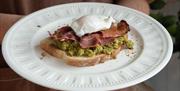 An image of Bacon, egg and avocado on toast