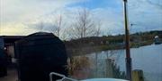 hottub by water with accomodation