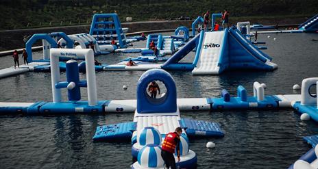 Image shows inflatables on the lake at Let's Go Hydro
