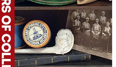 Image shows items in the exhibition including a sepia photograph of a group of women