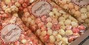 Image is of bags of popcorn being sold at the Lisburn Artisan Market