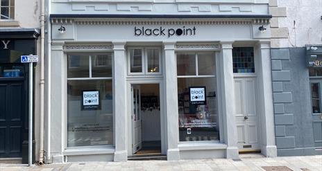 Image is of the front exterior of Blackpoint Perfumes in Bridge Street Lisburn