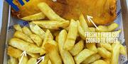 Image is of a portion of fish and chips from Chip Hawker