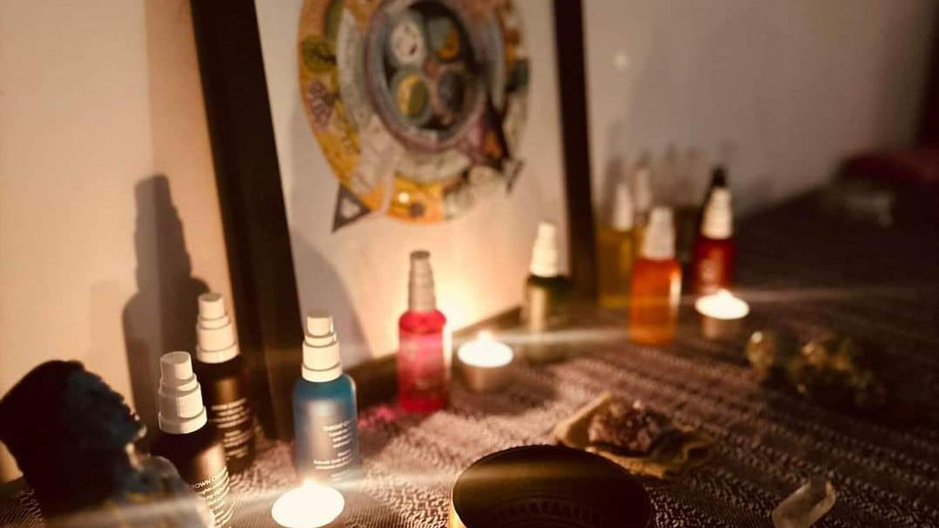 Image is of a treatment room burning candles and incense