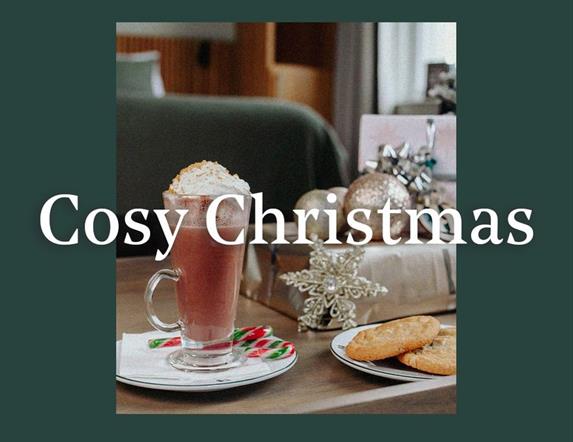 poster image is in dark green with Cosy Christmas wrtiting in white across the front. The image shown is a picture of a festive latte with a peppermin