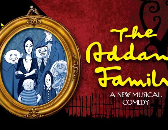 Image is of a poster advertising The Addams Family musical comedy at Lagan Valley Island