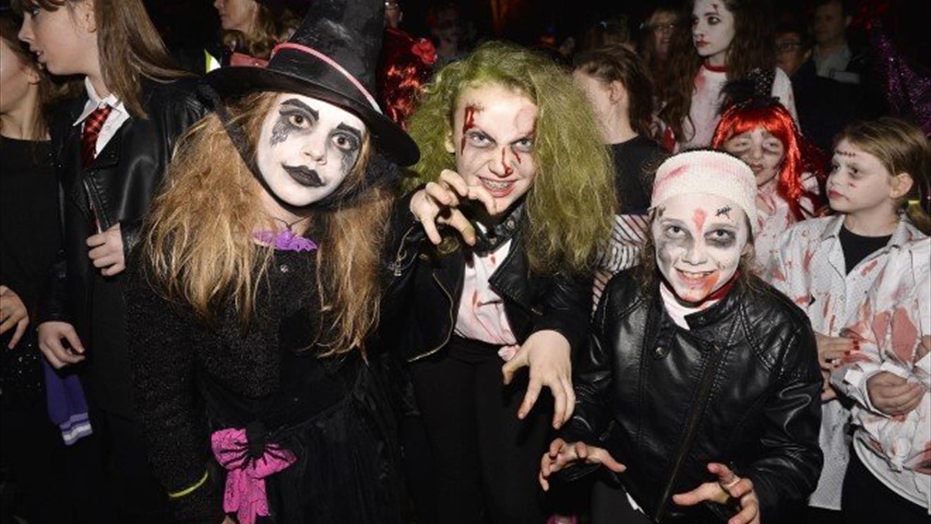 Image shows children dressed up for Halloween celebrations