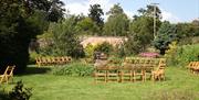 Image shows the gardens and seating within Larchfield Estate
