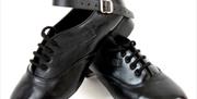 Image is of a pair of Irish black coloured dancing shoes