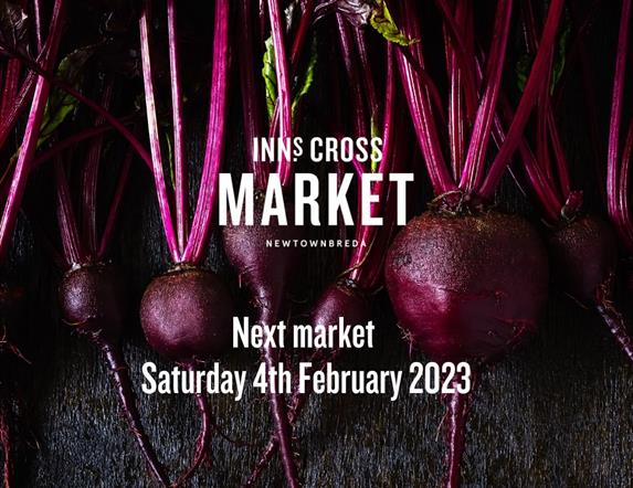 Image is of vegetables advertising the Inns Cross Market in Newtownbreda Belfast