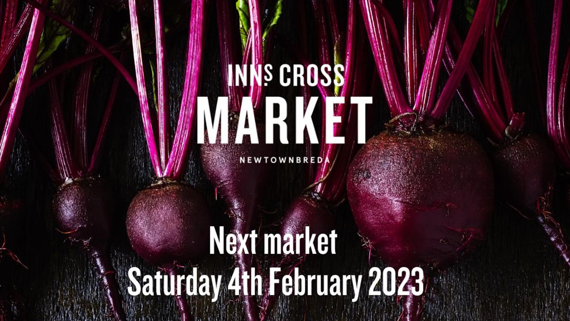 Image is of vegetables advertising the Inns Cross Market in Newtownbreda Belfast