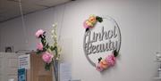 Image is of the interior wall of Linhol Beauty