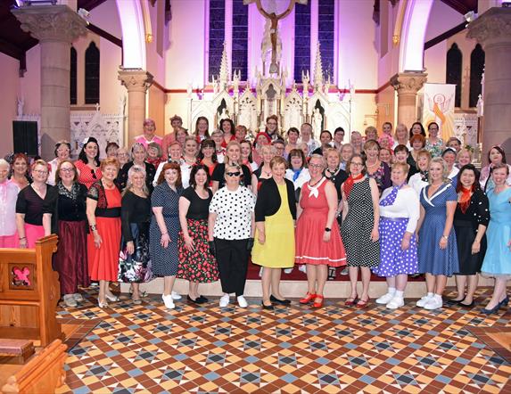Picture of the Lisburn Harmony choir inside a church