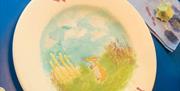 Glazed plate with I love You painted on it