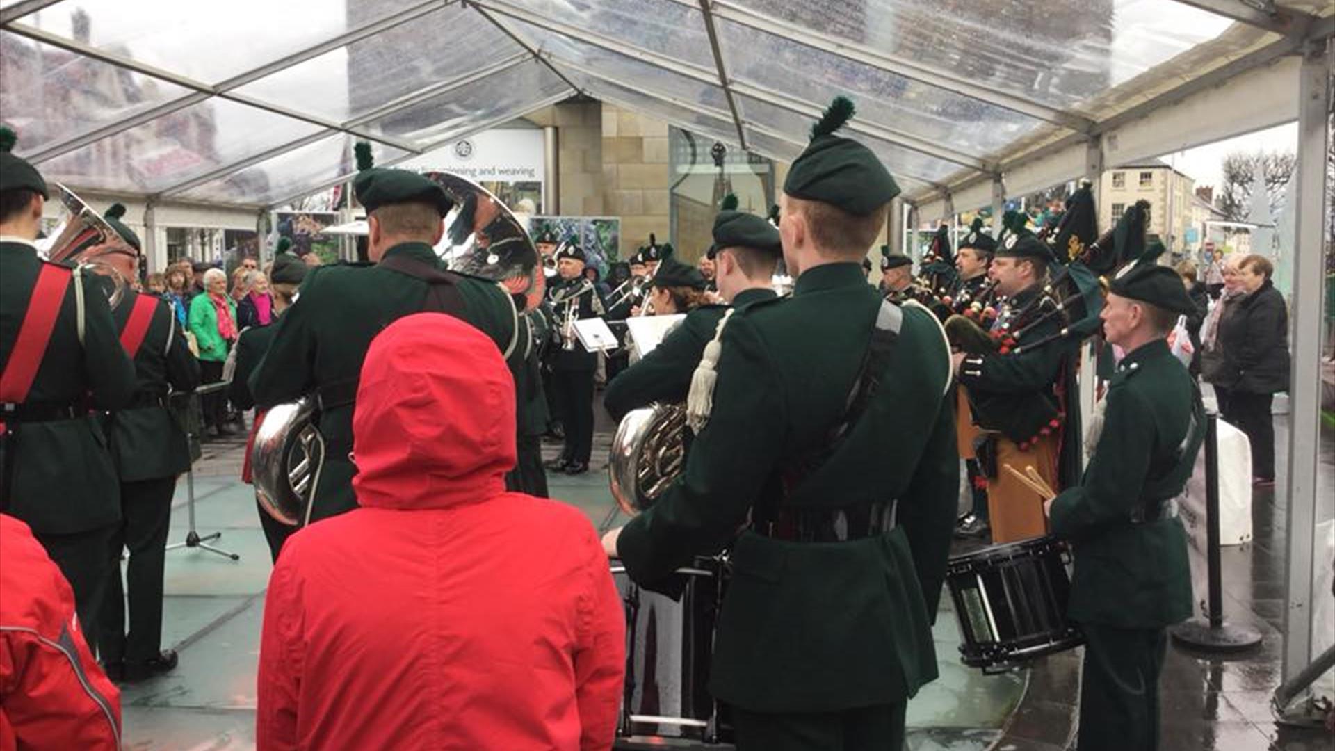 The Band of the Royal Irish Regiment performing for an audience in Market Square Lisburn