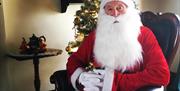 Image is of Santa Claus at The Ballance House