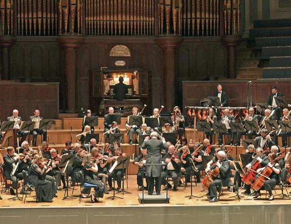 Image is of Studio Symphony Orchestra on stage