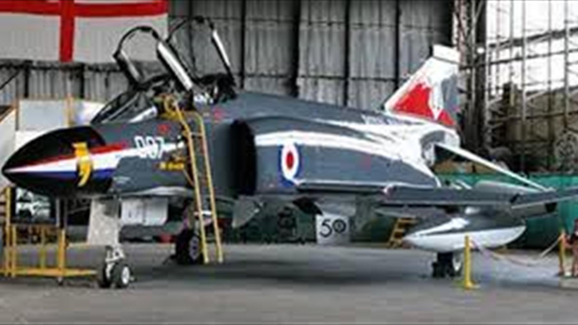 Image shows one of the aircraft on display in a hangar